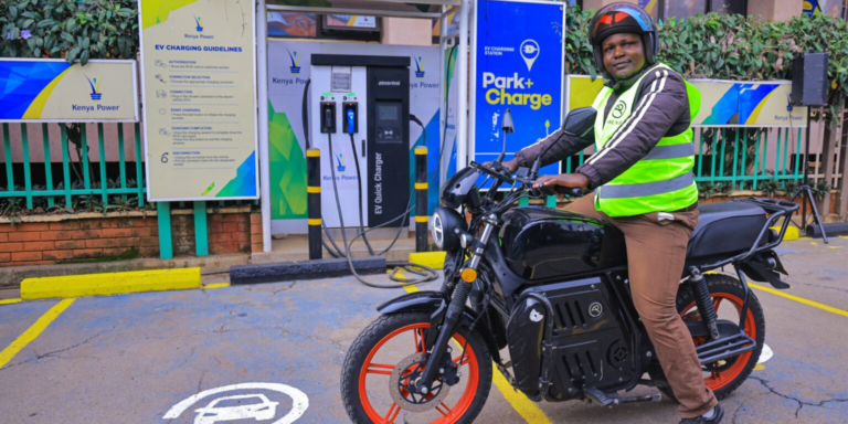 A motorbike rider with an electric bike in a KPLC charging station in Nairobi. PHOTO/ File