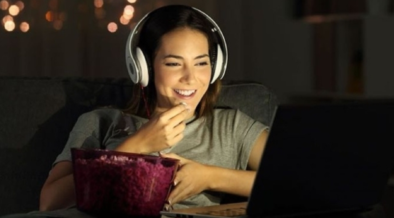 A girl watching a Movie. PHOTO/ Pinterest