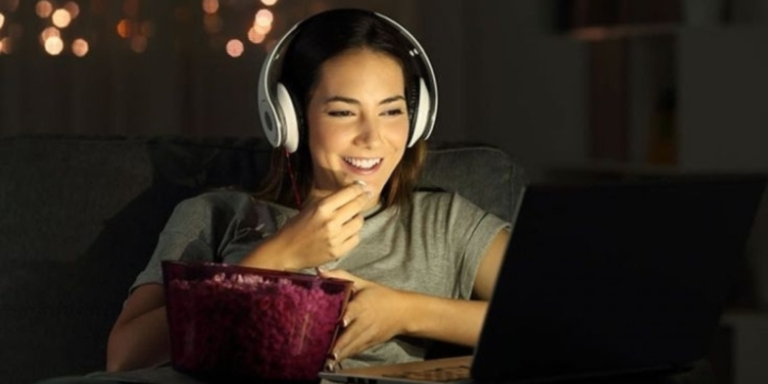 A girl watching a Movie. PHOTO/ Pinterest