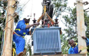 Kenya power workers working on a power line PHOTO/Standard