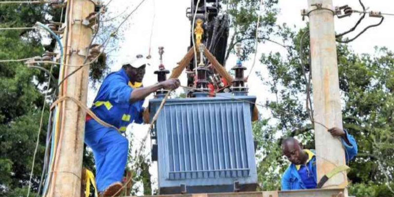 Kenya power workers working on a power line PHOTO/Standard