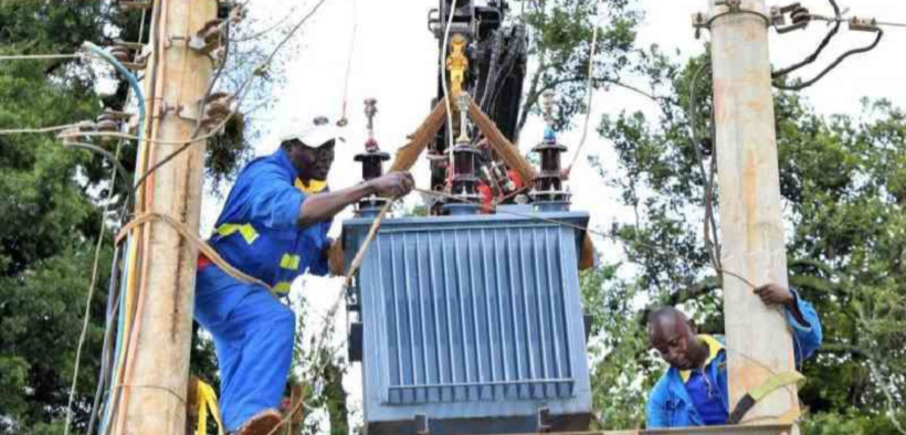 Kenya power workers working on a power line PHOTO/Standard