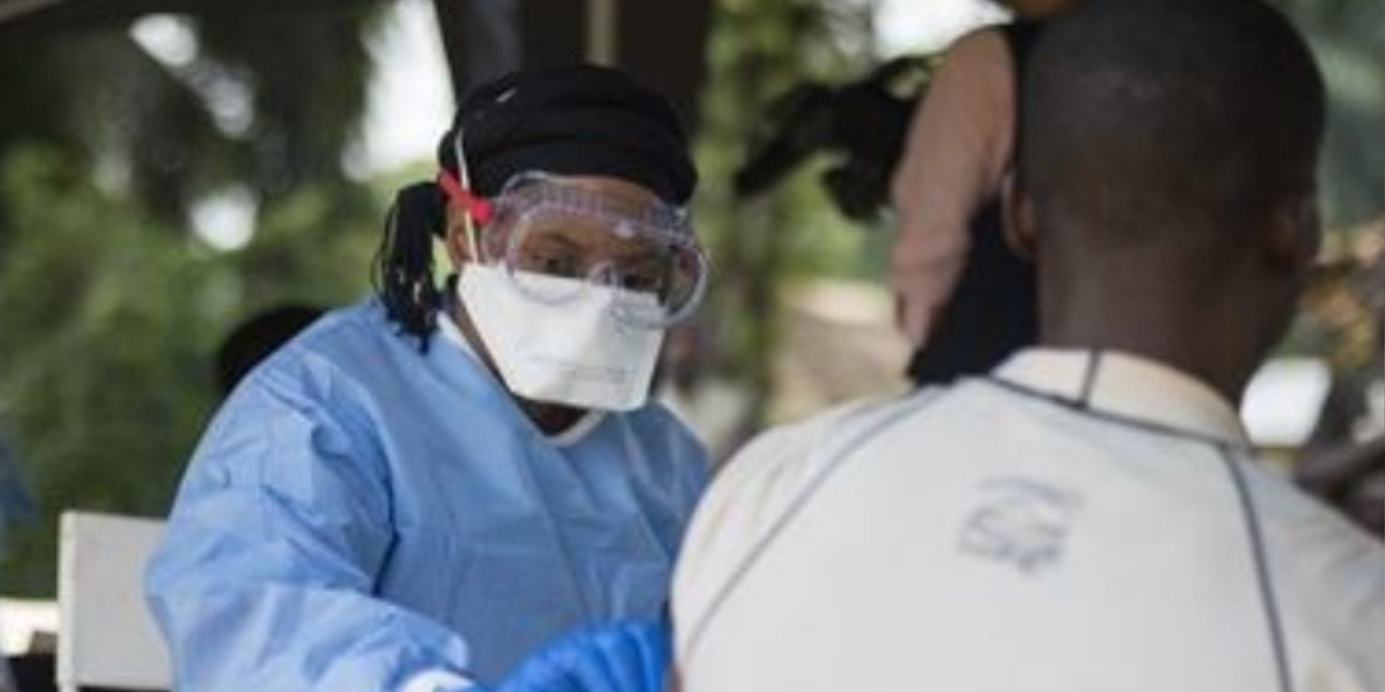 A doctor Screening a patient for Ebola. PHOTO/ WHO