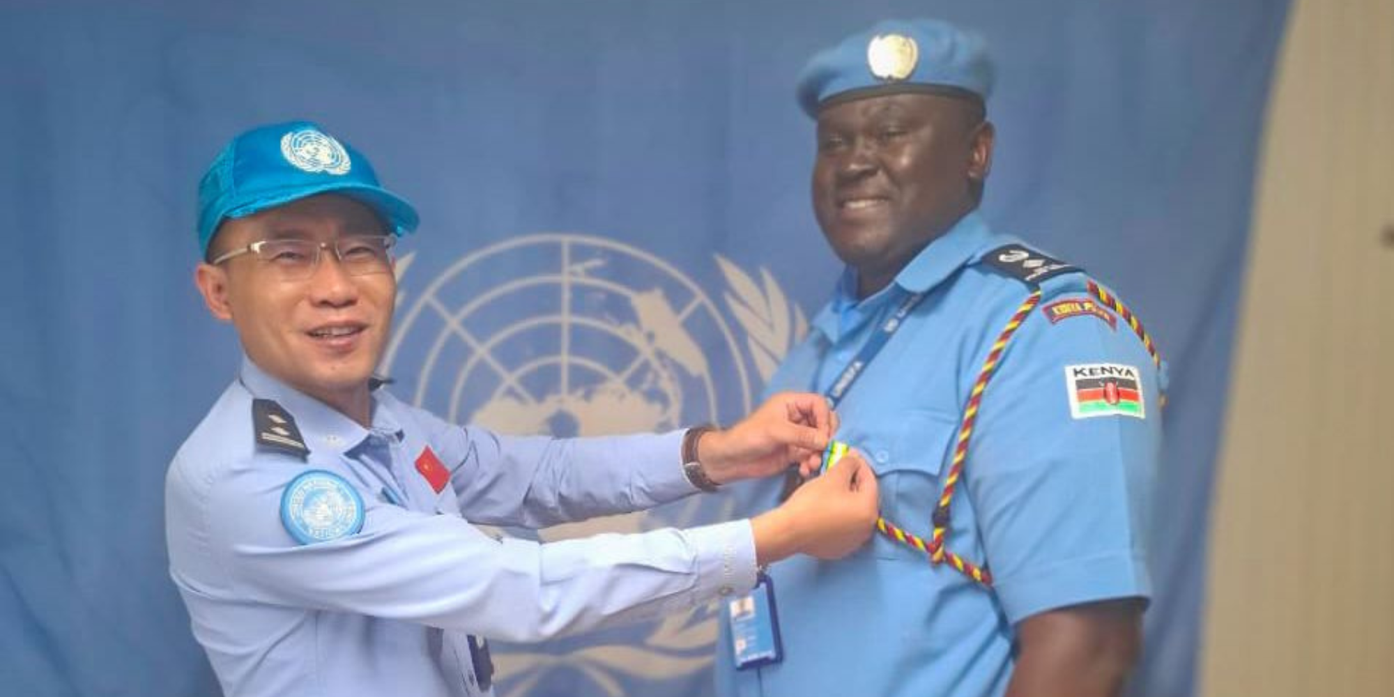 Superintendent Jared Alex Ondu Obura receiving a badge of honour while on an international mission. PHOTO/ NPS