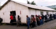 Residents in Kisii County carry a church building along a road during a protest over a pastor’s appointment of his daughter as treasurer without consultation