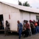 Residents in Kisii County carry a church building along a road during a protest over a pastor’s appointment of his daughter as treasurer without consultation