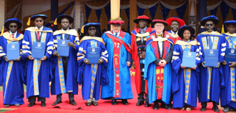 MKU PhD graduates pose for a photo with the Dr. Karim Khan, ICC Prosecutor, Chancellor Prof. John Struthers and Prof. JAGANYI, MKU Vice-Chancellor.