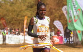 KWS officer Lydia Simiyu, bib 1099, breaks the tape to win the women’s 42km race at the 26th Lewa Safari Marathon in Isiolo on 27 June 2026.