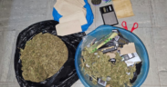 cannabis sativa concealed in a bluish basin and a black polythene bag, weighing scale, a pair of scissors, three lighters, Rizla rolling papers, a crusher, rolling flags and several small envelopes allegedly used for packaging recovered from a house in Nairobi following DCI raid. PHOTO/ DCI