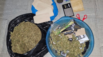 cannabis sativa concealed in a bluish basin and a black polythene bag, weighing scale, a pair of scissors, three lighters, Rizla rolling papers, a crusher, rolling flags and several small envelopes allegedly used for packaging recovered from a house in Nairobi following DCI raid. PHOTO/ DCI