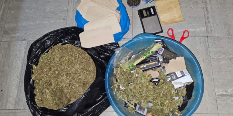cannabis sativa concealed in a bluish basin and a black polythene bag, weighing scale, a pair of scissors, three lighters, Rizla rolling papers, a crusher, rolling flags and several small envelopes allegedly used for packaging recovered from a house in Nairobi following DCI raid. PHOTO/ DCI
