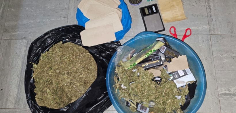 cannabis sativa concealed in a bluish basin and a black polythene bag, weighing scale, a pair of scissors, three lighters, Rizla rolling papers, a crusher, rolling flags and several small envelopes allegedly used for packaging recovered from a house in Nairobi following DCI raid. PHOTO/ DCI