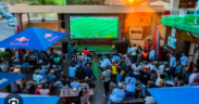 Football fans gather at an open restaurant to watch a football match. PHOTO/ File