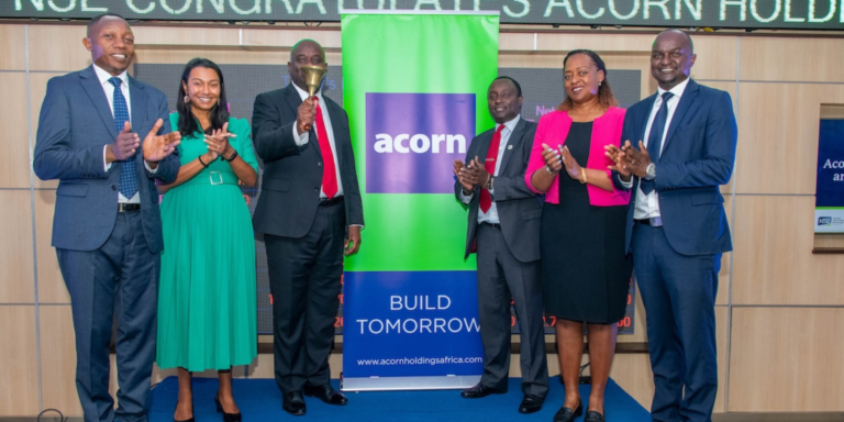 Acorn Holdings CEO Edward Kirathe (Center Left) rings the Bell at the NSE during the redemption of the Acorn Green Bond in Nairobi. PHOTO/ File