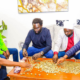 Ol Kalou residents join Nyandarua Senator John Methu as they count Ksh 10 contributions collected to buy a suit for MP aspirant Sammy Ngotho, turning an insult into a show of unity ahead of the by-election. PHOTO/ Citizen Digital