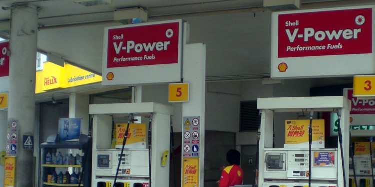 A row of fuel pumps at a Shell gas station featuring large red signs advertising Shell V-Power Performance FuelsPHOTO/Shell