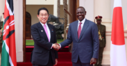 Japanese Prime Minister Kishida receiving greetings from President William Ruto during his state visit to Kenya in May 2023