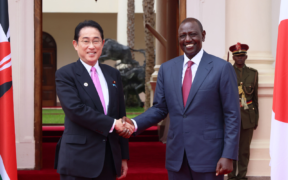 Japanese Prime Minister Kishida receiving greetings from President William Ruto during his state visit to Kenya in May 2023