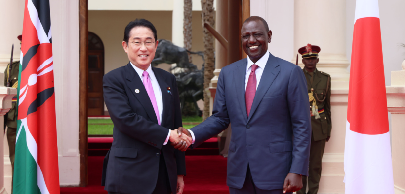 Japanese Prime Minister Kishida receiving greetings from President William Ruto during his state visit to Kenya in May 2023