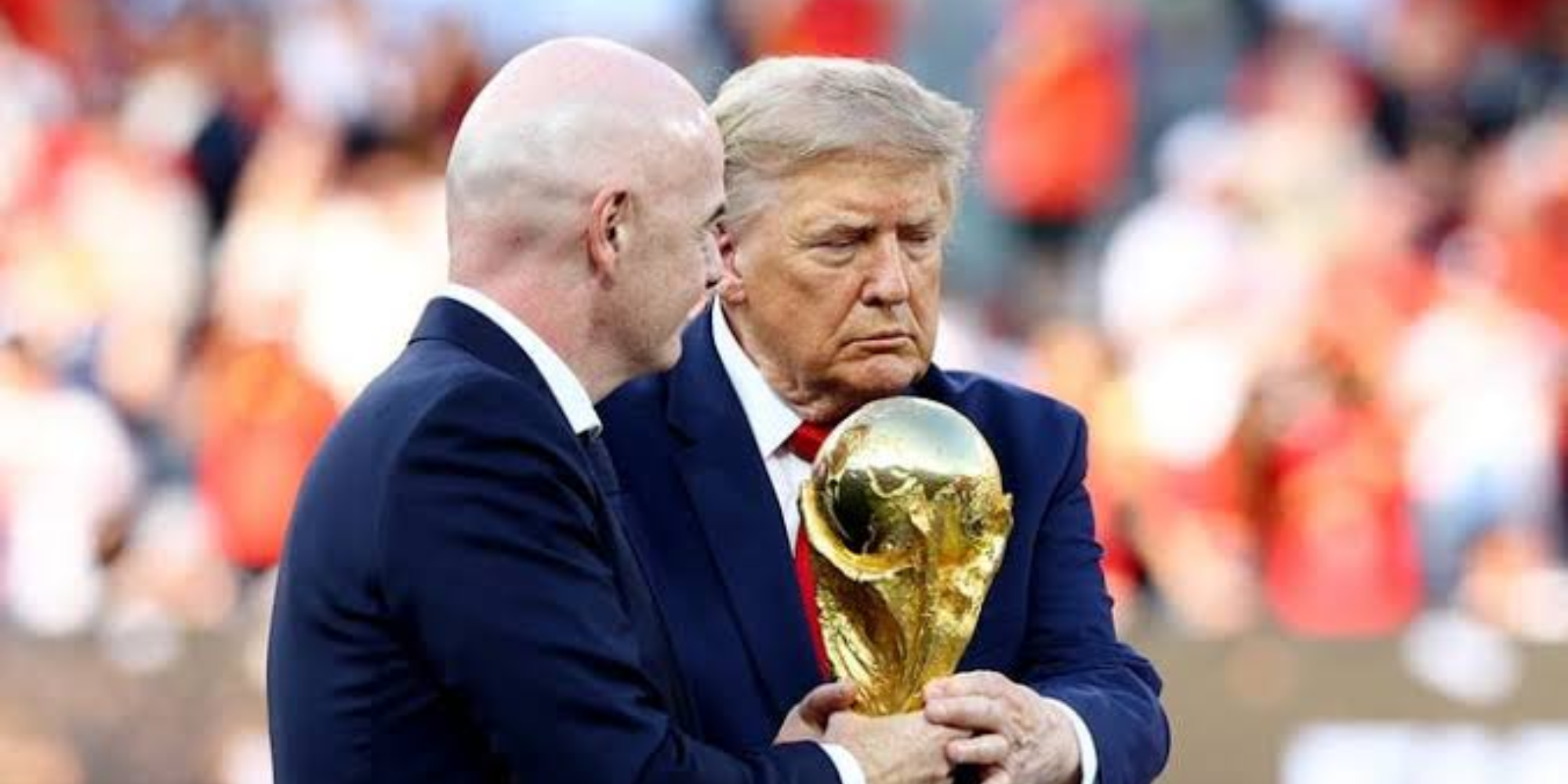 U.S. President Donald Trump and FIFA President Gianni Infantino with the trophy after the 2026 World Cup final between Argentina and Spain. PHOTT/REUTERS/Lee Smith