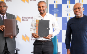 George Odhiambo, Managing Director, National Bank of Kenya; Martin Kariuki, General Manager, Vipingo Development and Ralph Opara, Access Bank Regional Managing Director, East Africa and Country Managing Director, Kenya, during the NBK-Centum MoU signing in Vipingo, Kilifi. PHOTO/File
