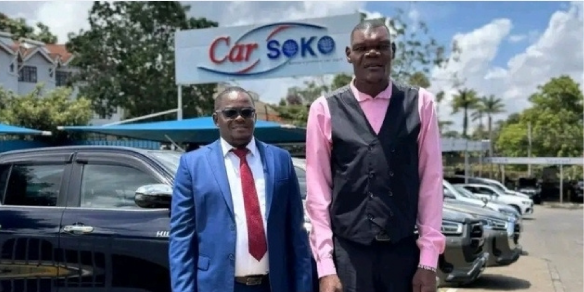 Patrick Riang’a and Goliath wa Bungoma at Car Soko Ltd. PHOTO/ Patrick Riang’a FB
