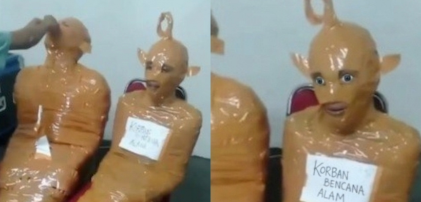 Thieves turned into “Teletubbies” after Indonesian locals wrapped them entirely in tape, sparking mixed reactions online after the viral video. PHOTO/ Screengrab