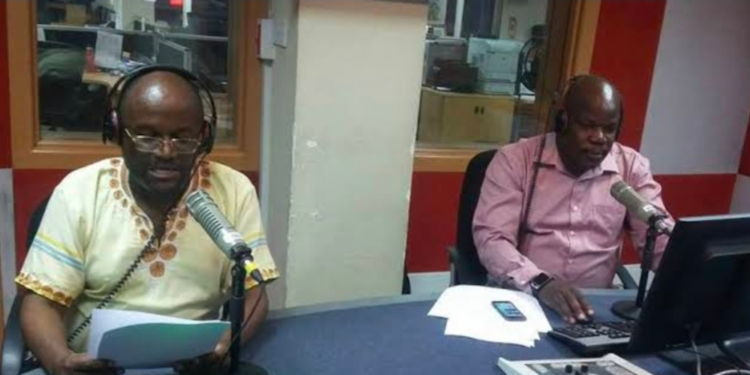 Muliro Telewa with his colleague in studioPHOTO/Standard