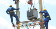 Kenya Power and Lighting Company personnel installing a transformer in undisclosed location in Kenya. PHOTO/ File