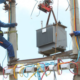 Kenya Power and Lighting Company personnel installing a transformer in undisclosed location in Kenya. PHOTO/ File