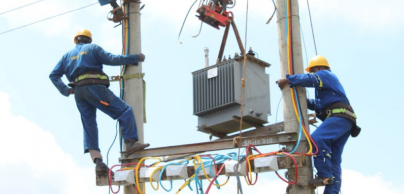 Kenya Power and Lighting Company personnel installing a transformer in undisclosed location in Kenya. PHOTO/ File