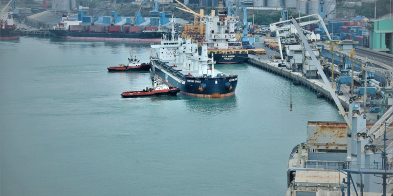 A container vessel being pushed by mini boats at Mombasa Port for docking. PHOTO/ File