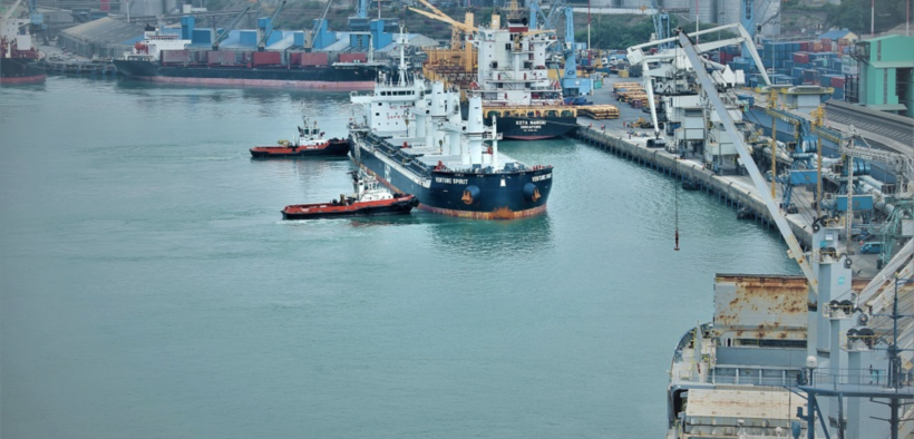 A container vessel being pushed by mini boats at Mombasa Port for docking. PHOTO/ File