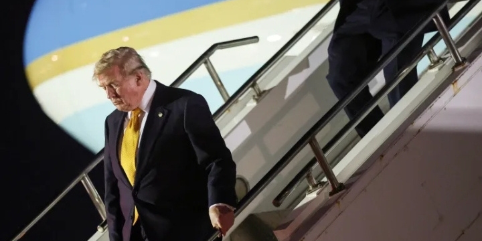 A photo of US President Donald Trump as he steps off Air Force One to board the new Qatari-gifted Boeing plane, en route to the US, at Royal Air Force Mildenhall, in Milidenhall, England on July 8. PHOTO/ Win McNamee, Getty Images