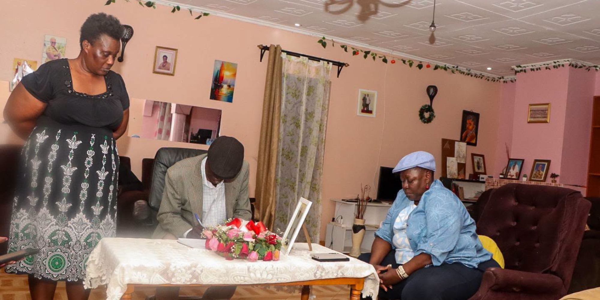 A photo of Ruth Odinga paying her respect to the late cousin Job Odima Atinga . Photo /Ruth Odinga