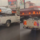 A photo showing uncovered coffin being transported on road. Photo/ Mosiria
