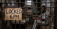 An AI-generated photograph showing a man seated inside a cell. PHOTO: Gemini