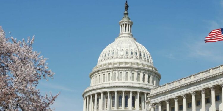 The United States Capitol dome and an American flag PHOTO/Reuters