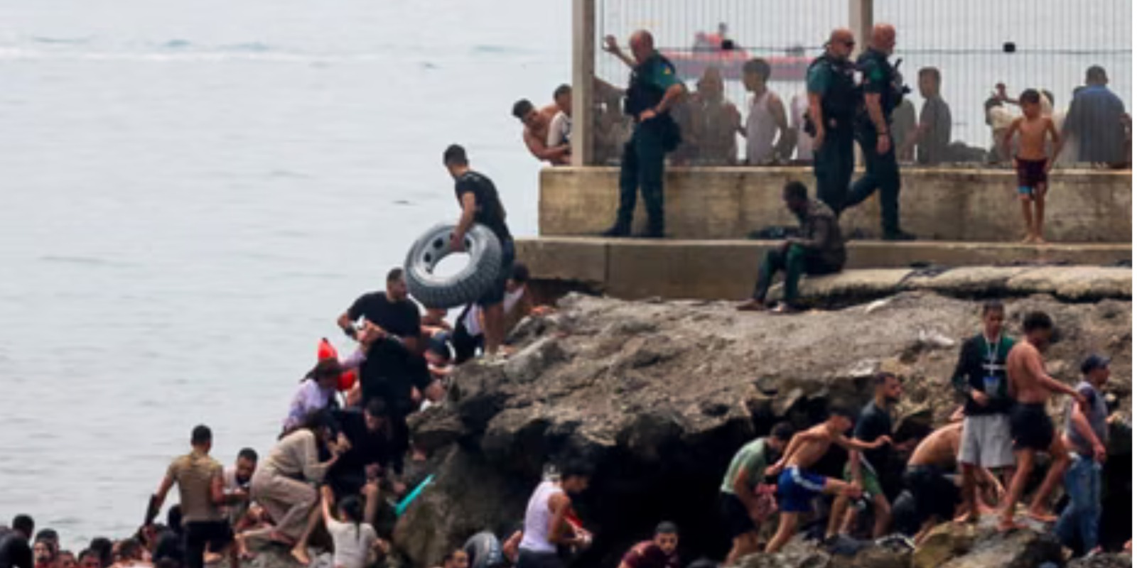 A photo showing migrants swimming to spain . Photo/ File