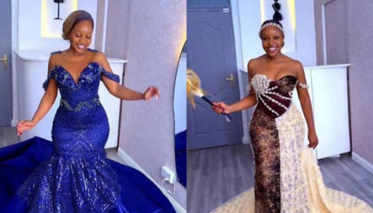 Photo showing Joan Peter , the founder and CEO House of Adhis showing off her designers. Photo/ HOA