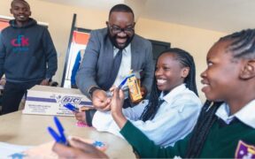 Students receiving BIC pens PHOTO/File