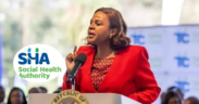 A photo of the Chief Executive Officer of Kenya's Social Health Authority (SHA) Dr. Mercy Mwangangi delivering a national COVID-19 update at Afya House during the pandemic during her tenure as the Chief Administrative Secretary (CAS) for the Ministry of Health in Kenya and an insert of SHA logo. PHOTO/ MoH Facebook/ SHA
