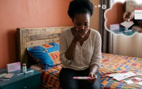 A woman holds a positive pregnancy test after emergency contraception fails. PHOTO/ Ai- generated